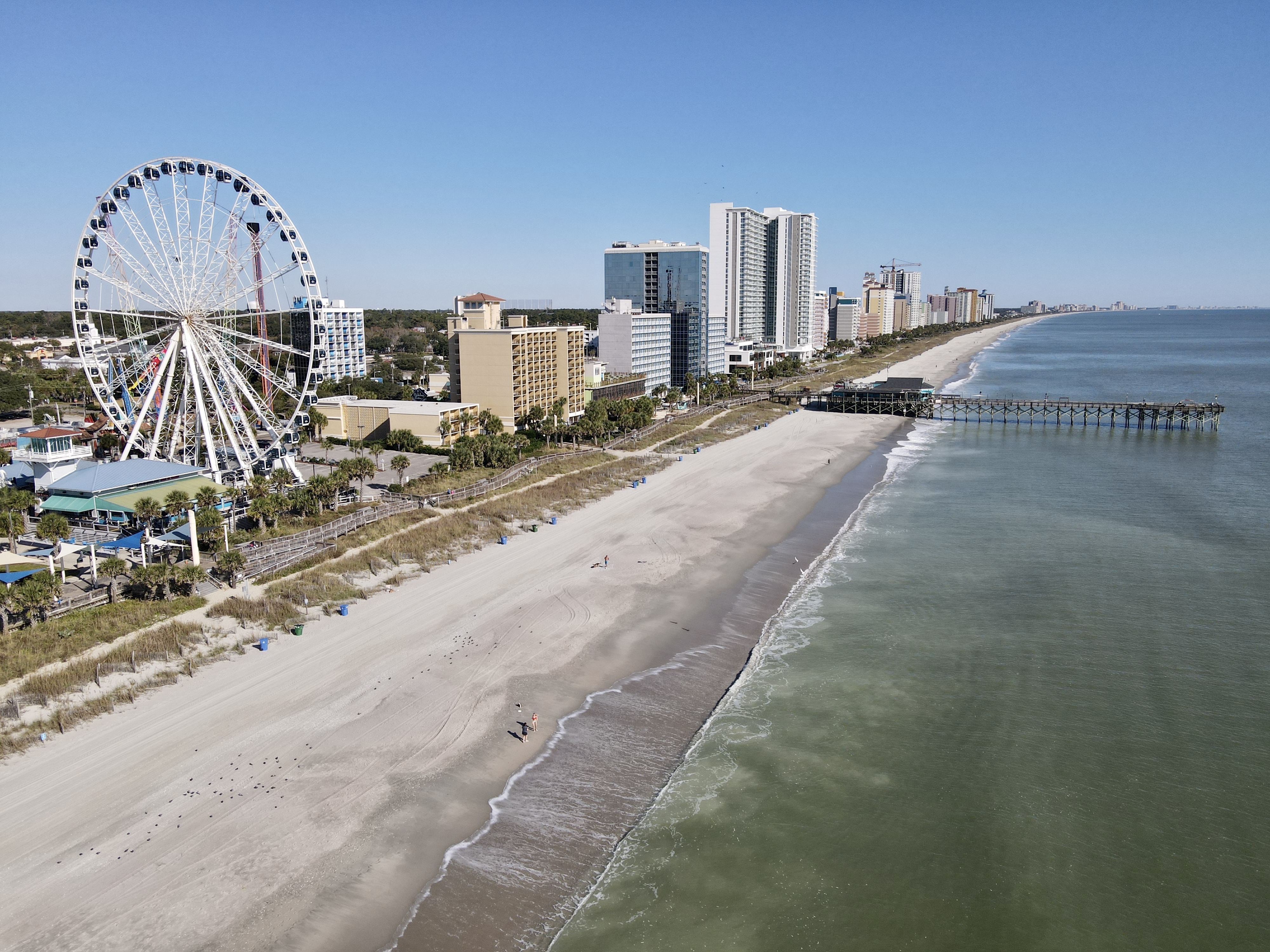 view of myrtle beach in the air showing ferris wheel and buildings
